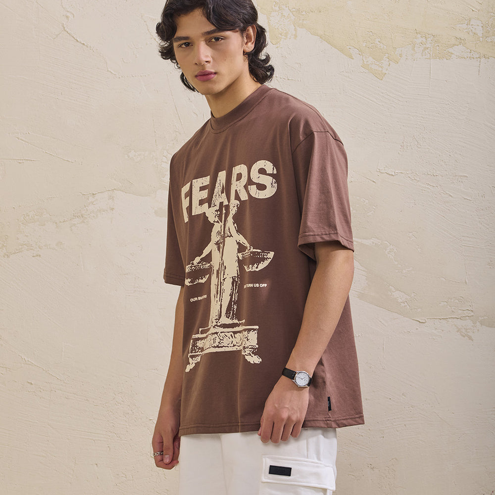 
                      
                        Camiseta oversized our shadows- café
                      
                    