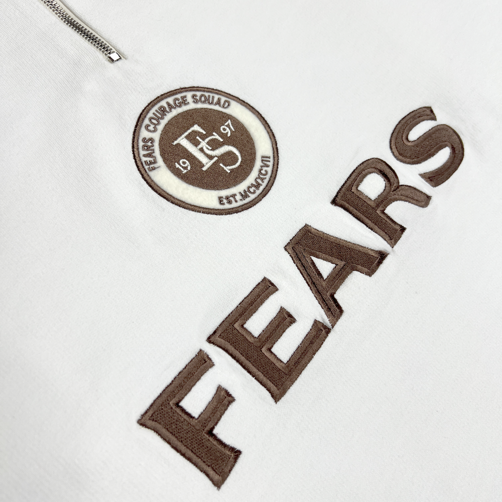
                      
                        Buzo quarter zip- Hueso
                      
                    